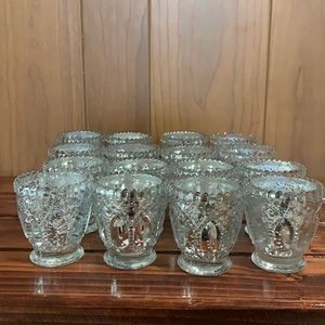 Decorative silver votive holders, set of 16